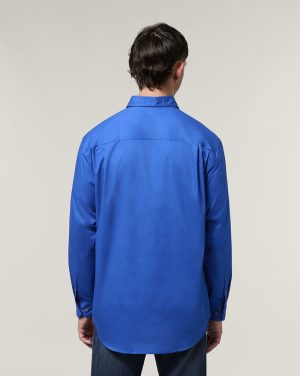 Back view of a man wearing a blue Mustang Closed Front Workshirt.