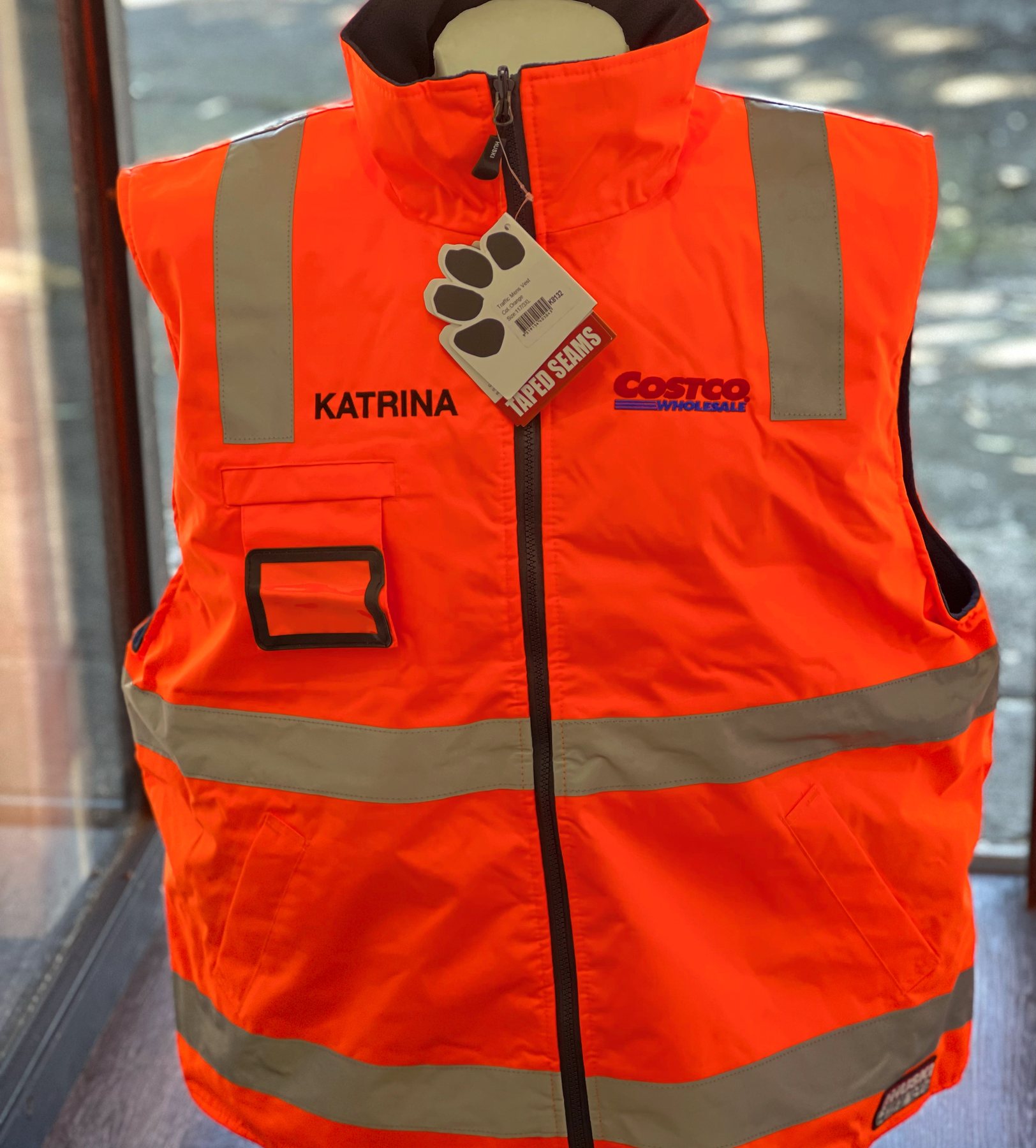 Hobart custom uniforms orange hi vis work vest with embroidered name and logo